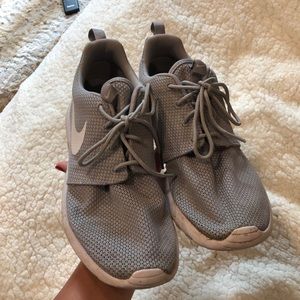 Grey Nike tennis shoes